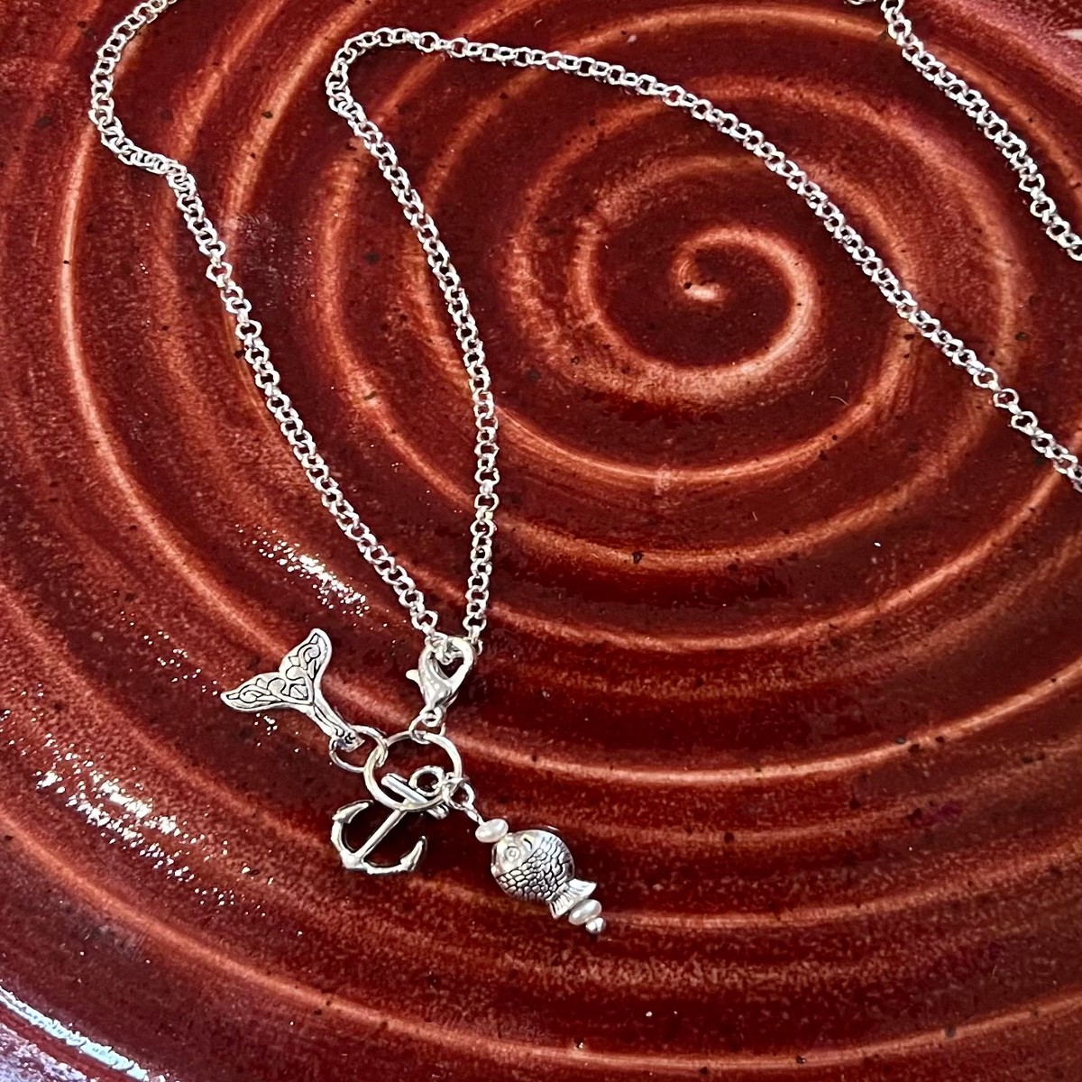 Nautical Charms on a Long Chain Necklace by Rebecca Coutlee
